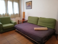 Salón con cama de matrimonio