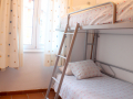 Dormitorio con literas abatibles